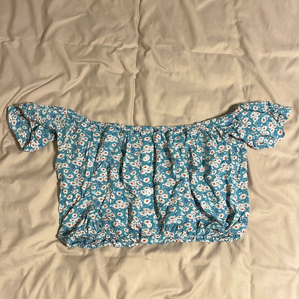 Millau blue top with flowers
